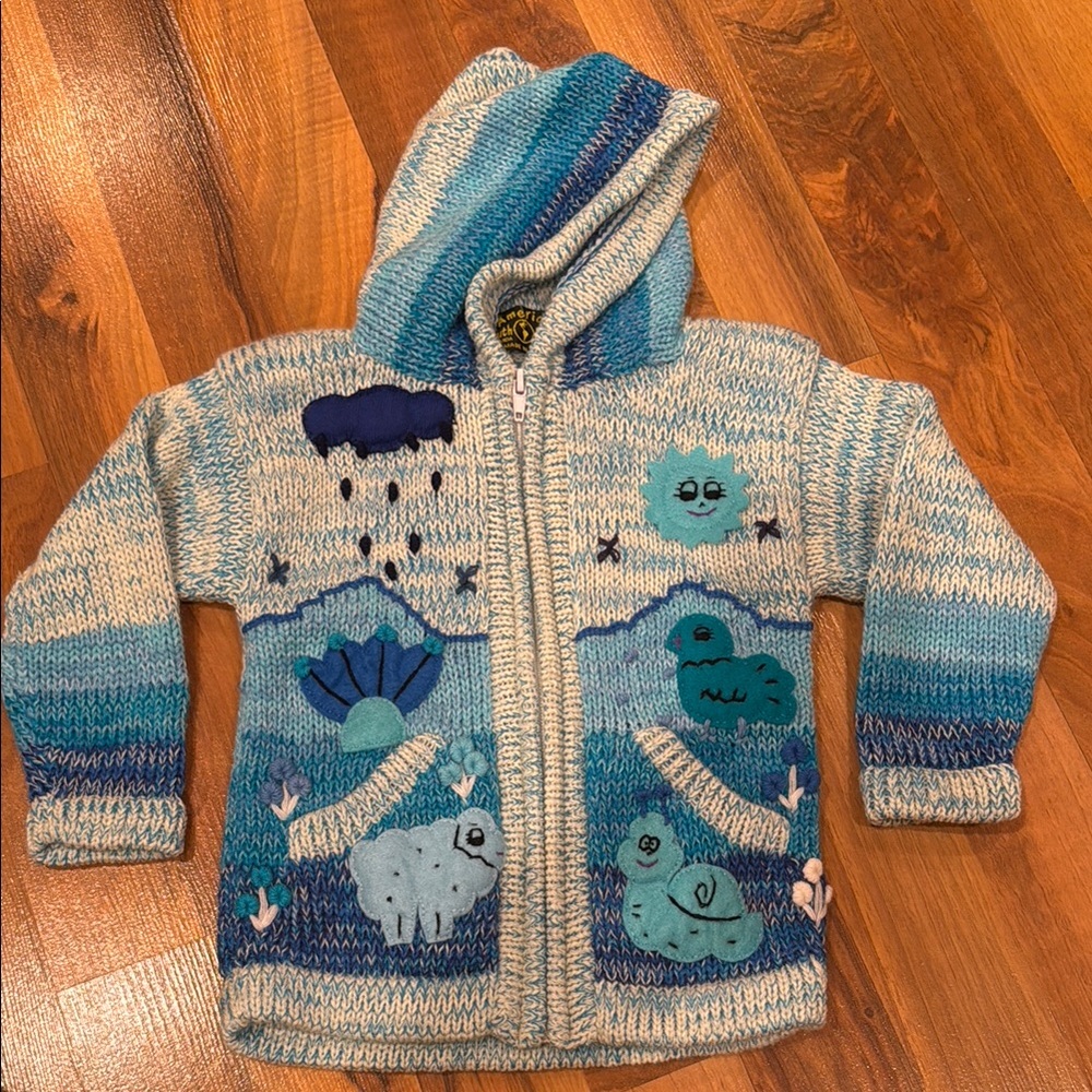 Handmade in Peru girls size 2 blue knit sweaterter with sewn on‎ designs knit